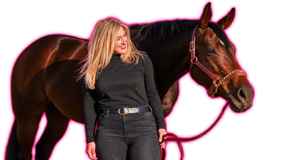 Cat Allen smiling, glancing away, beside her mare Unbridled Dixie, a dark bay Thoroughbred.