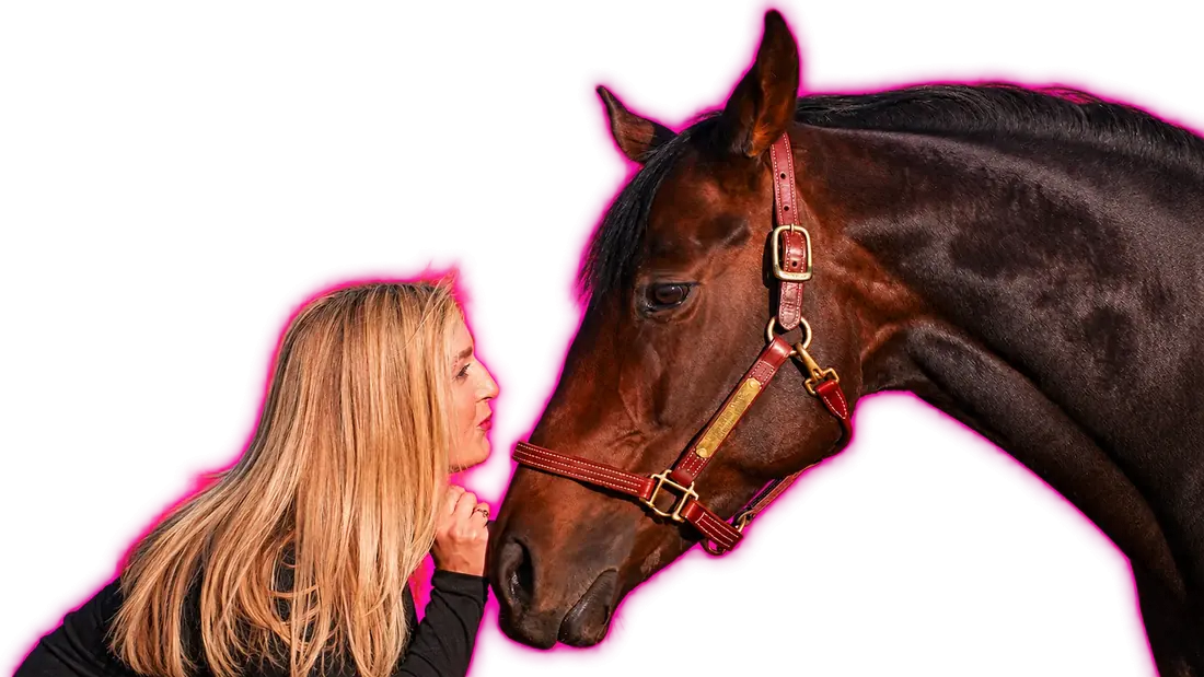 Cat Allen and her Thoroughbred mare Unbridled Dixie nose to nose.